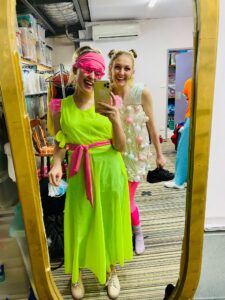 Maddie and Chelsea in Costume in the Dressing Room